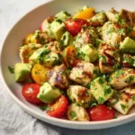 Delicious Avocado Chicken Salad served in a bowl with fresh ingredients
